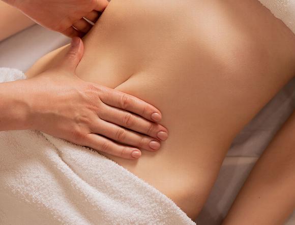 Slimming massage on ladies stomach