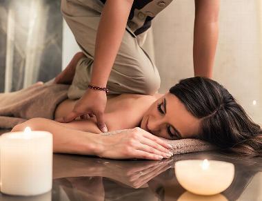 Lady receiving traditional Thai massage at clinic
